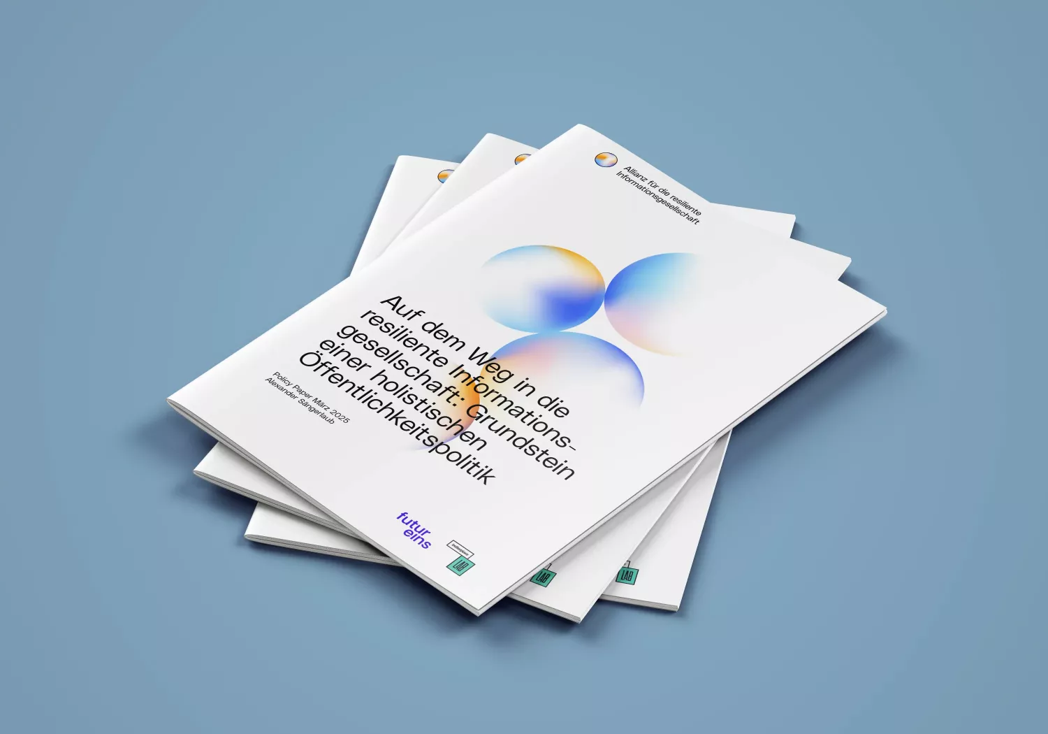 Stacked brochures on a blue background, title \