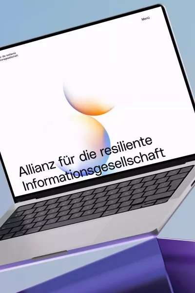 Floating laptop in front of a blue background, with the website of the \