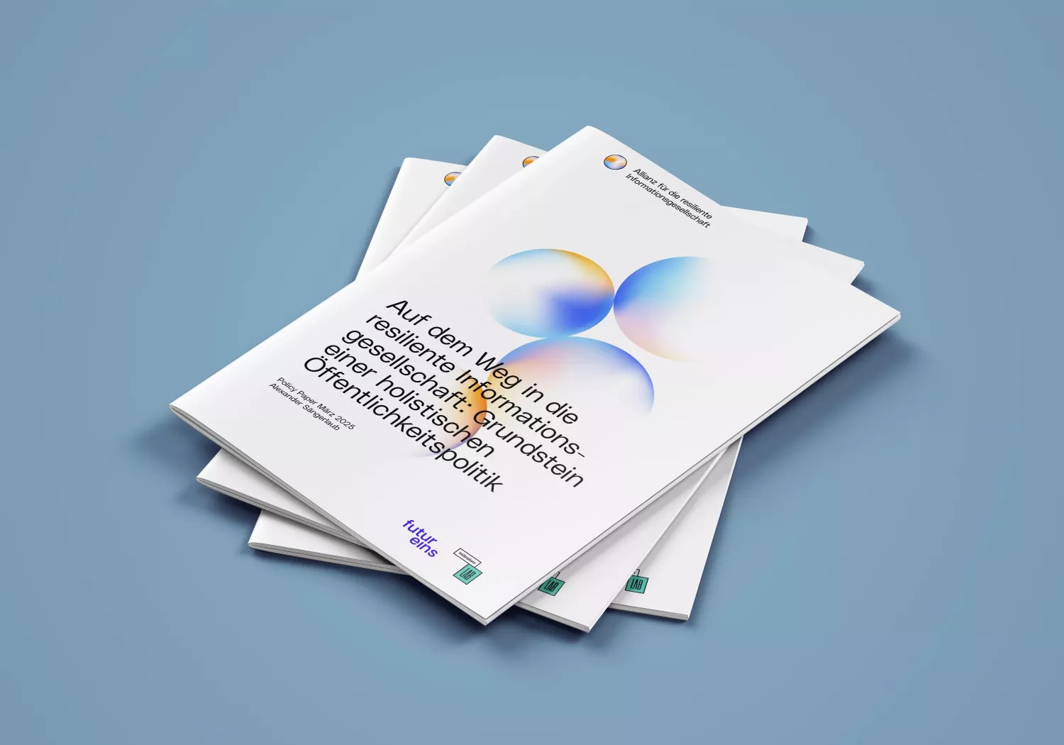 Stacked brochures on a blue background, title \