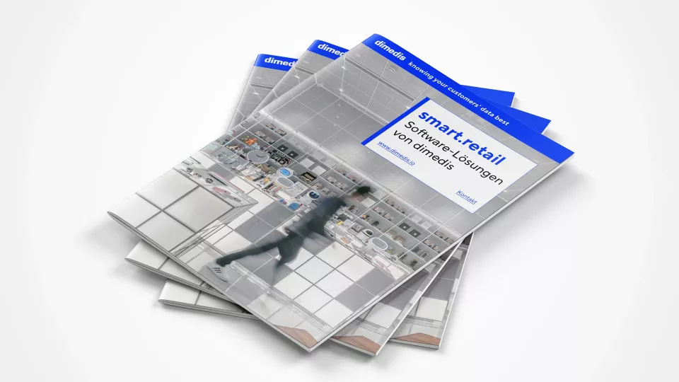 Several brochures stacked on top of each other on a white background, title \