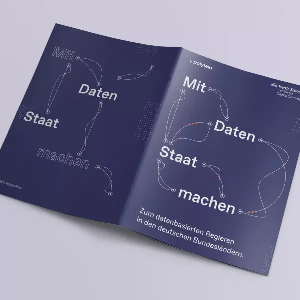 Double-sided publication with dark blue cover, title \