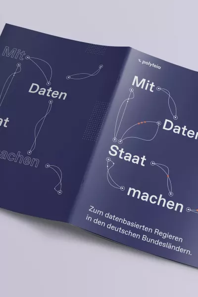 Double-sided publication with dark blue cover, title \