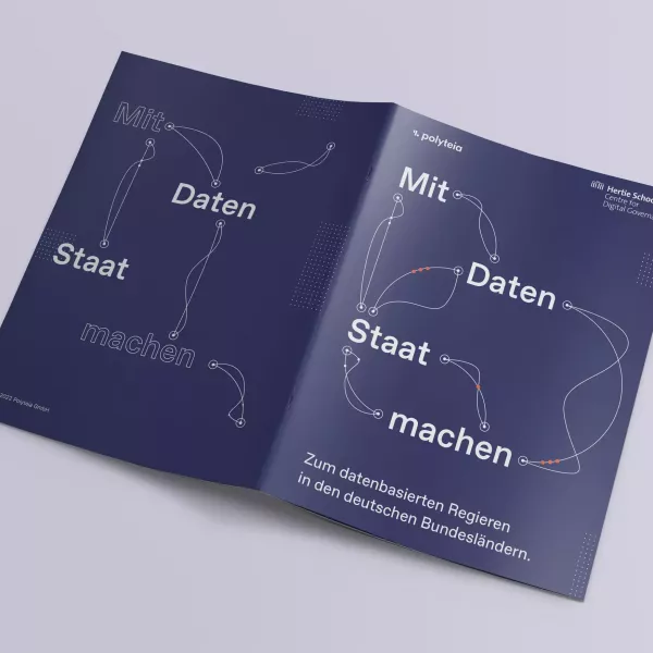 Double-sided publication with dark blue cover, title \