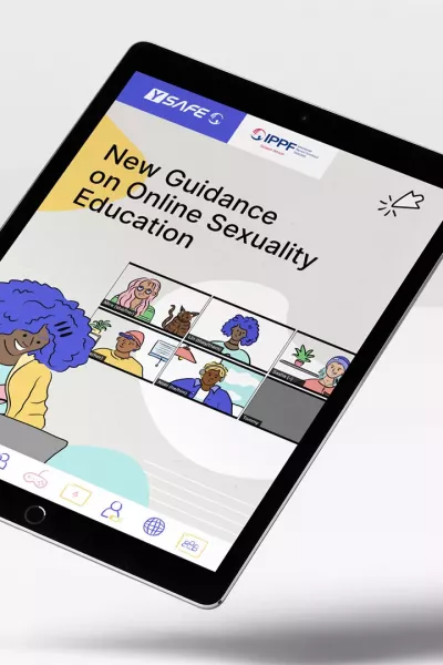 A floating tablet on a gray background displays the digital toolkit for comprehensive sexuality education