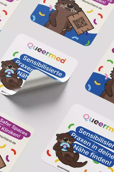 Colorful stickers with otter illustrations and the words \
