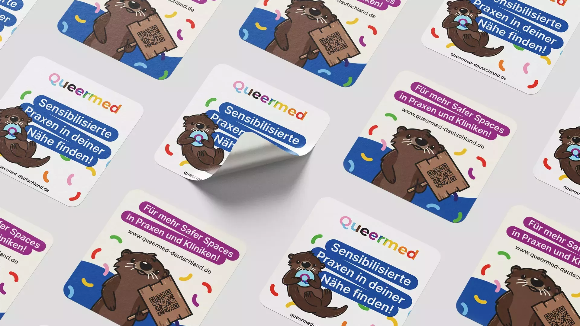 Colorful stickers with otter illustrations and the words \