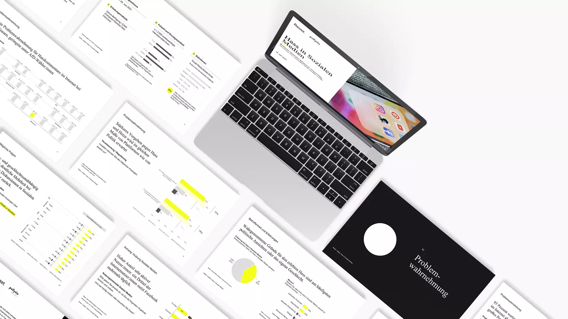 An open laptop with a screenshot of the website and the title „Hass in Sozialen Medien“ (Hate in Social Media) surrounded by additional screenshots of the website with diagrams and text Designed in black, white, and yellow